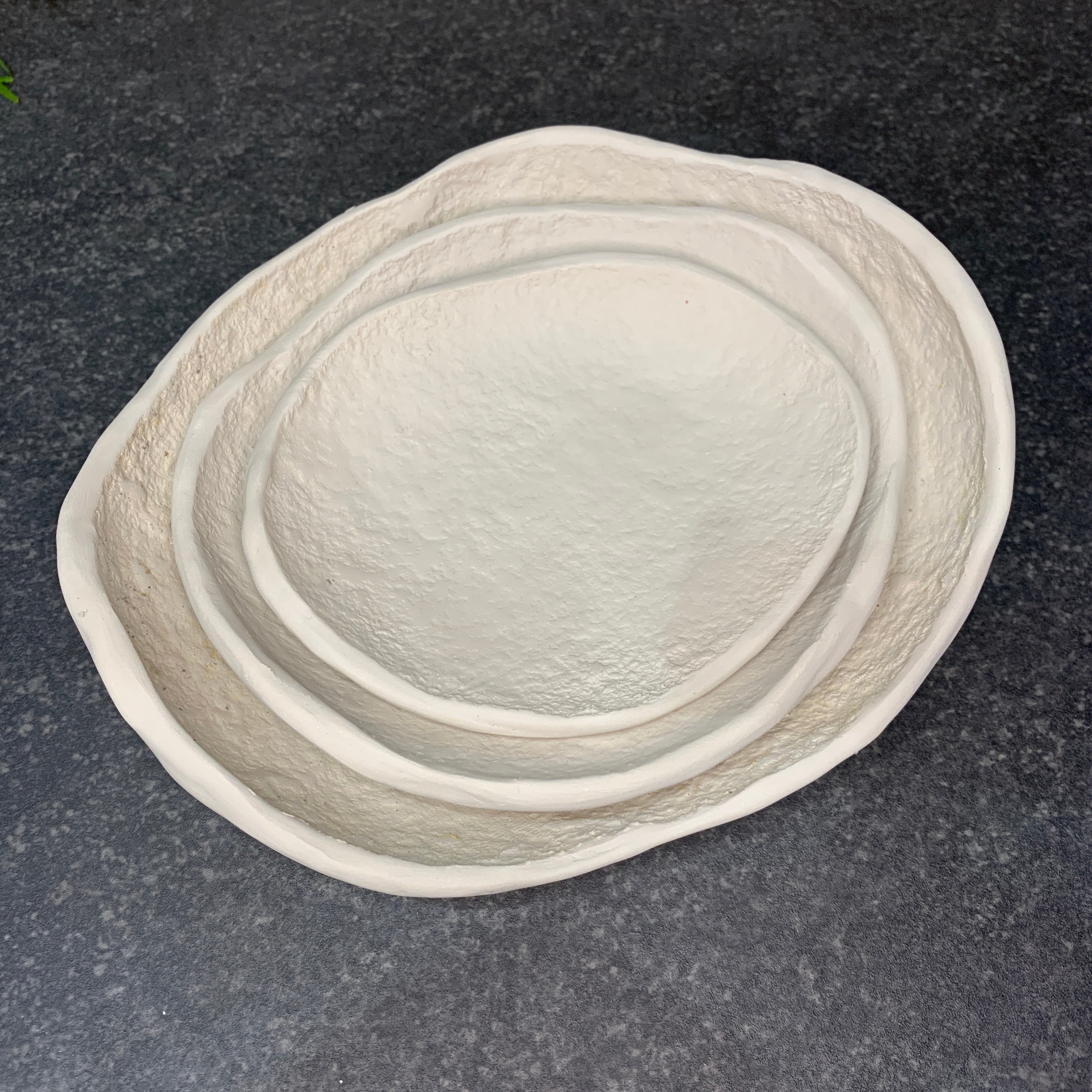 Nesting rock plates - Sand and water